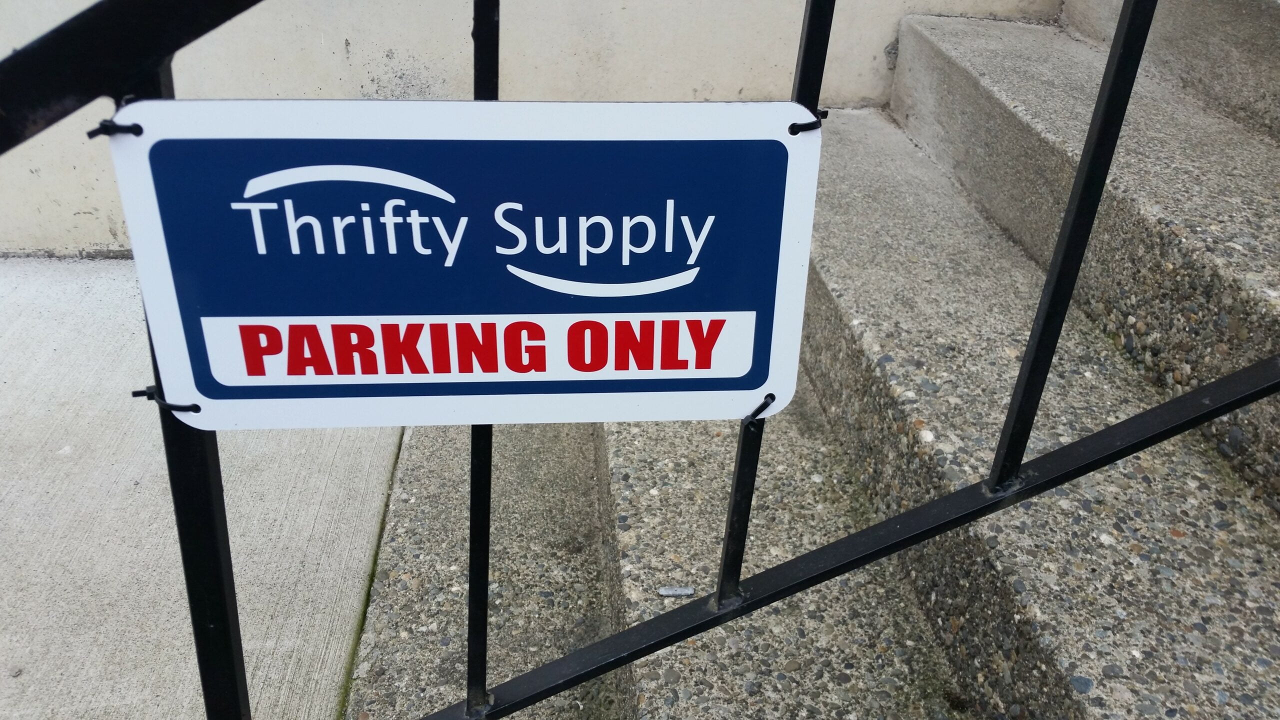 Custom parking sign for parking lot of business