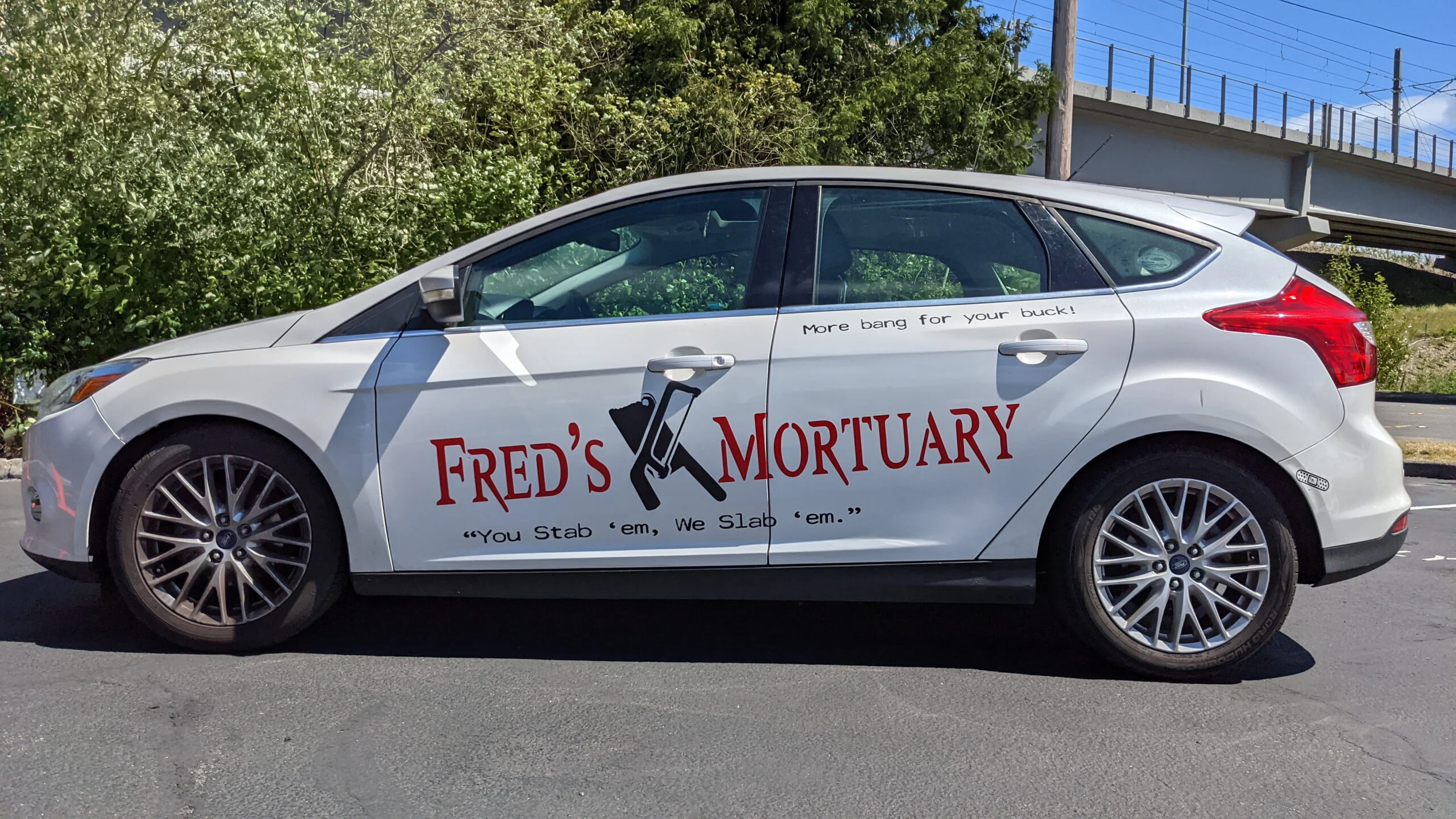Custom vehicle graphics for advertising on cars and fleet vehicles.