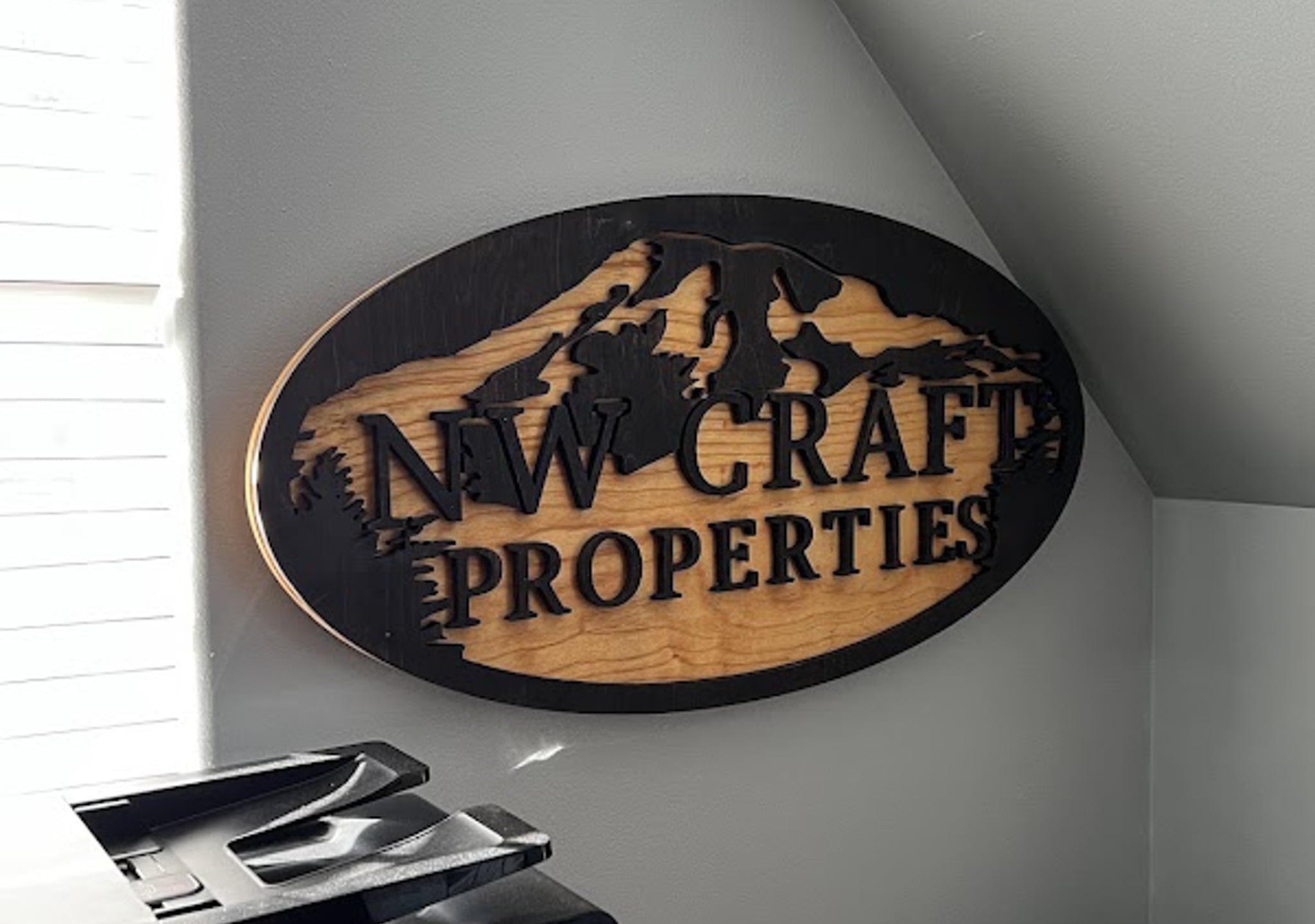 CNC wood sign by Galactic Sign Co for Real Estate Company