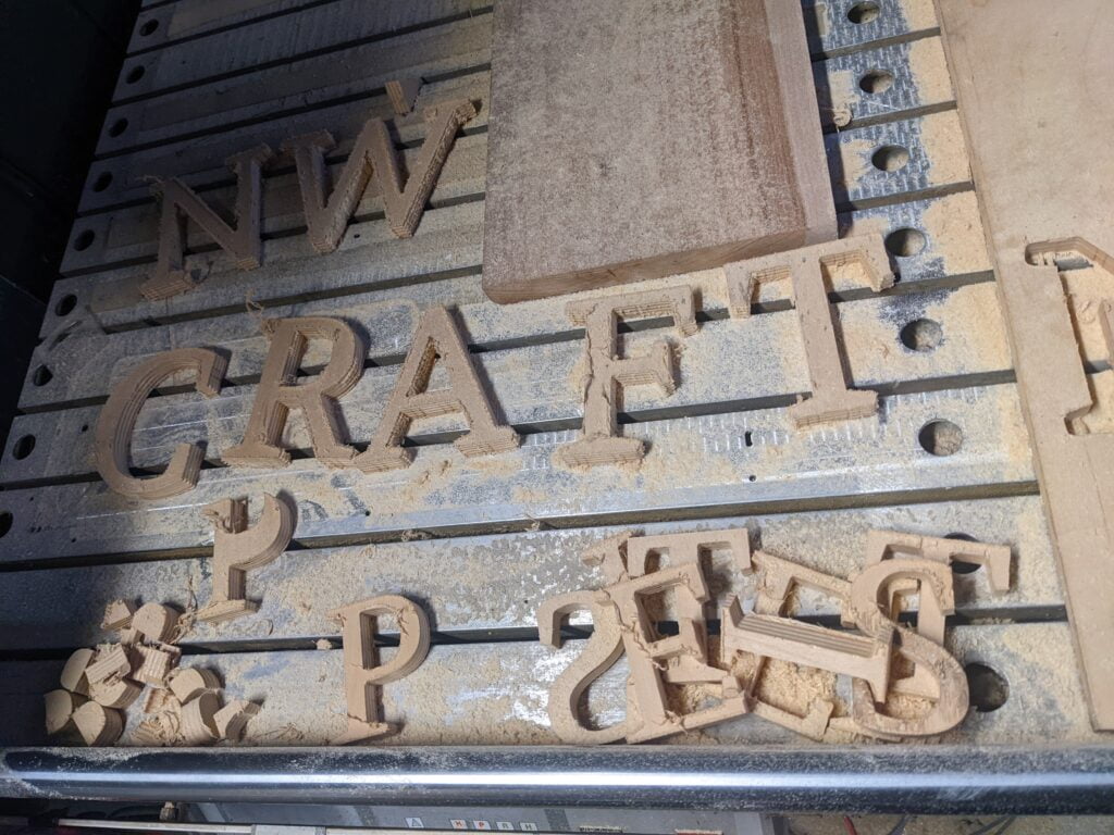 Custom CNC machine cut letters out of wood by Galactic Sign Co.