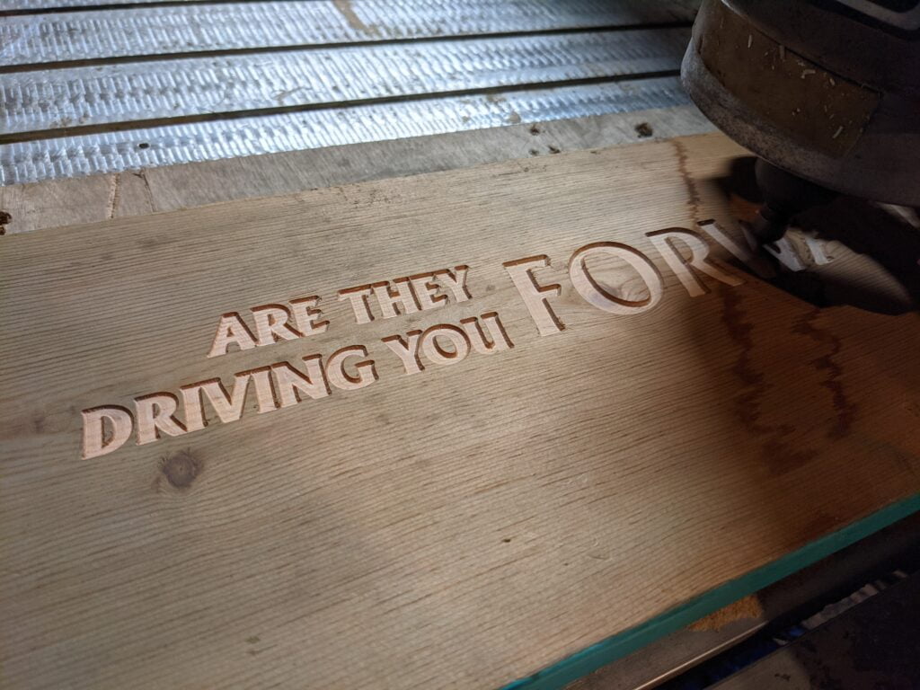 Custom CNC wood sign with rocket by Galactic Sign Co.