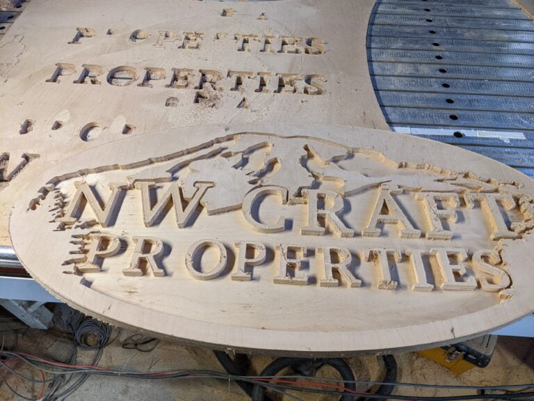Custom wood CNC sign for real estate business by Galactic Sign Co.