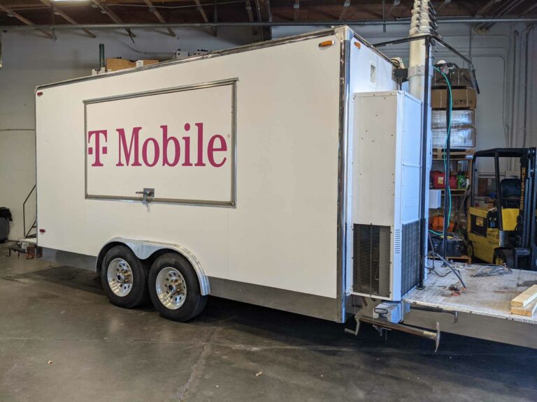 Custom trailer wrap with T-mobile logo by Galactic Sign Co. in Auburn, WA