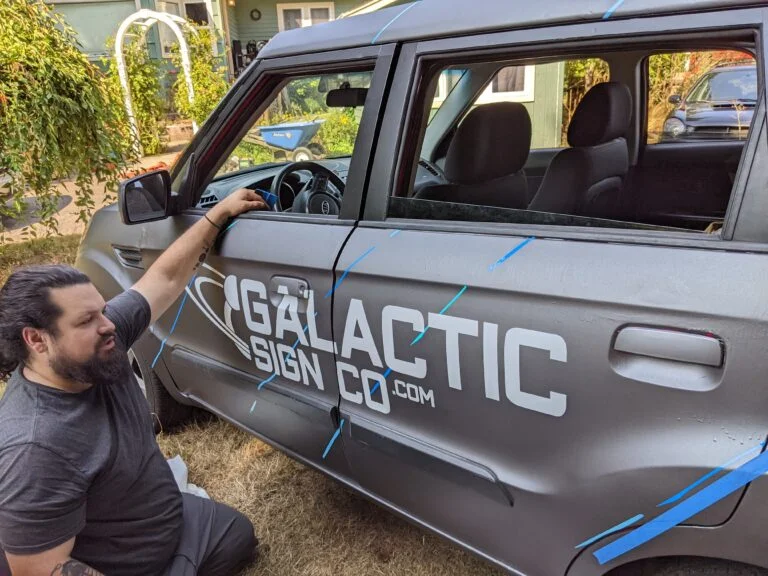 Custom vehicle graphics and wrap logo on a compact SUV car by Galactic Sign Co.