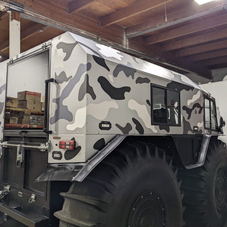 Custom vehicle graphics camouflage car wrap by Galactic Sign Co. in Auburn, WA