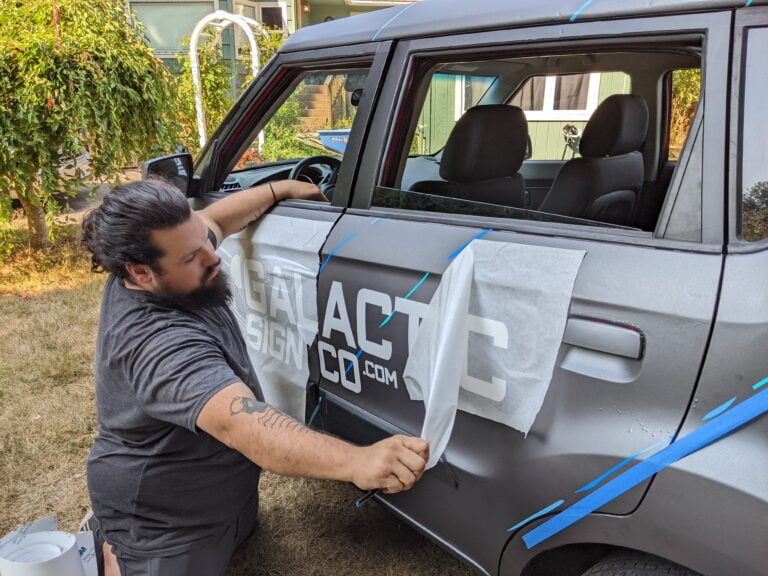 Custom vehicle graphics logo on a compact SUV car by Galactic Sign Co.