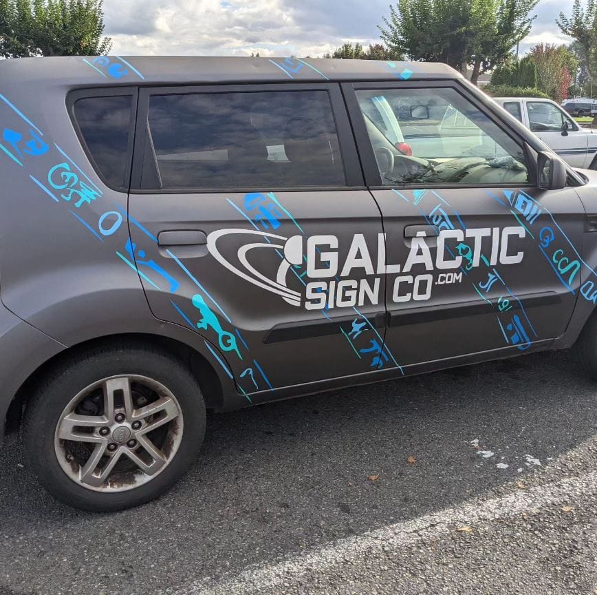 Custom car wrap design advertising for business by Galactic Sign Co